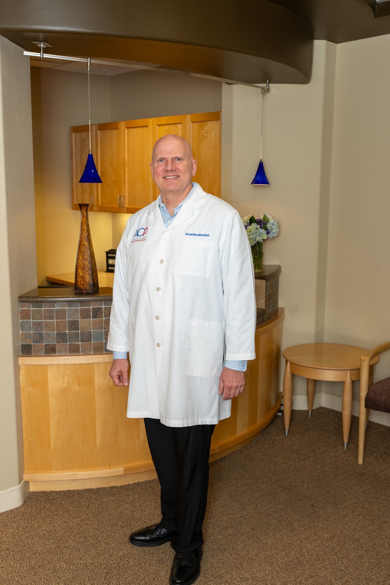 Dr. Andrus standing in the practice's reception area