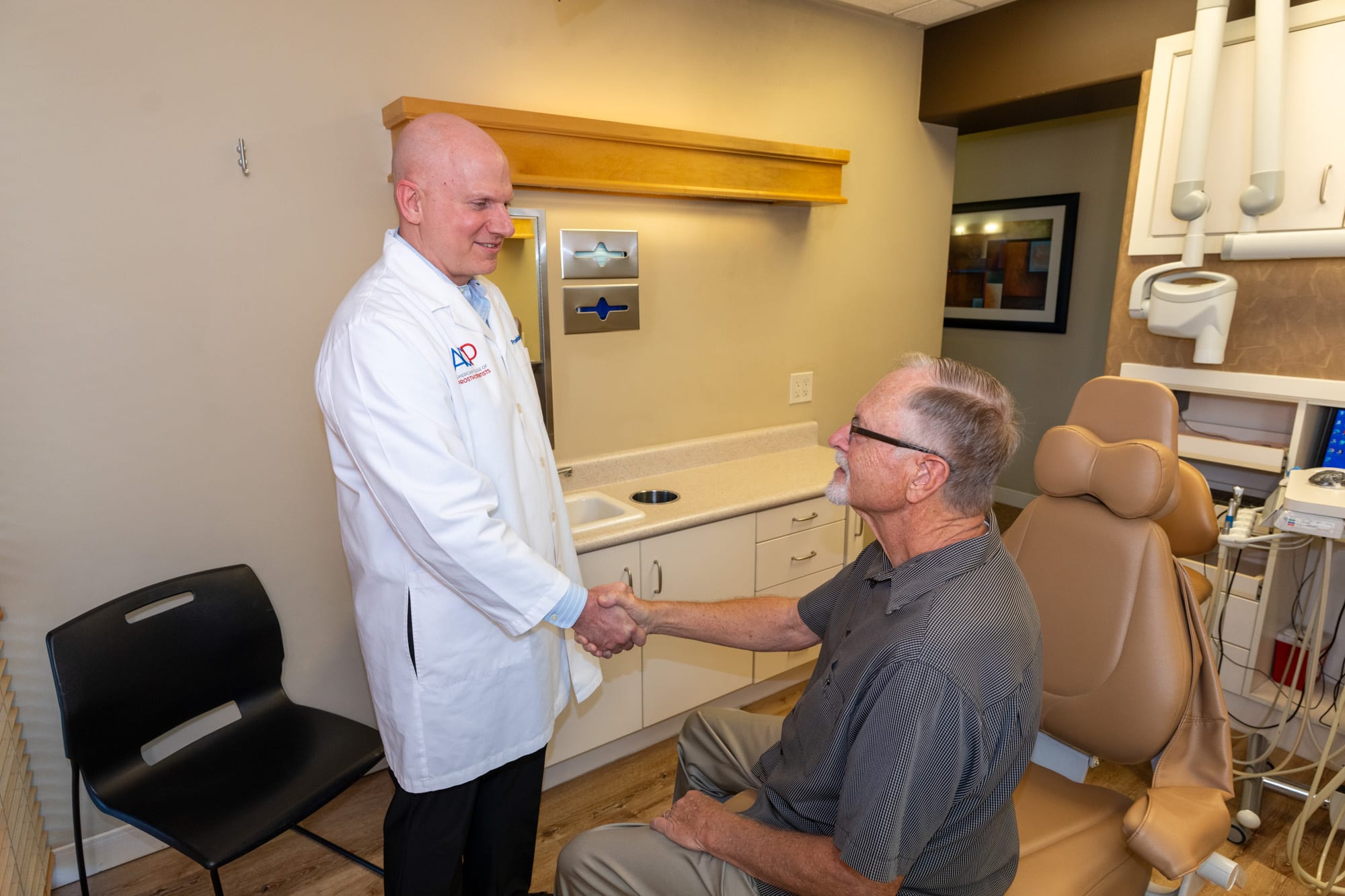 Dr. Andrus greeting a new patient at the start of their first visit